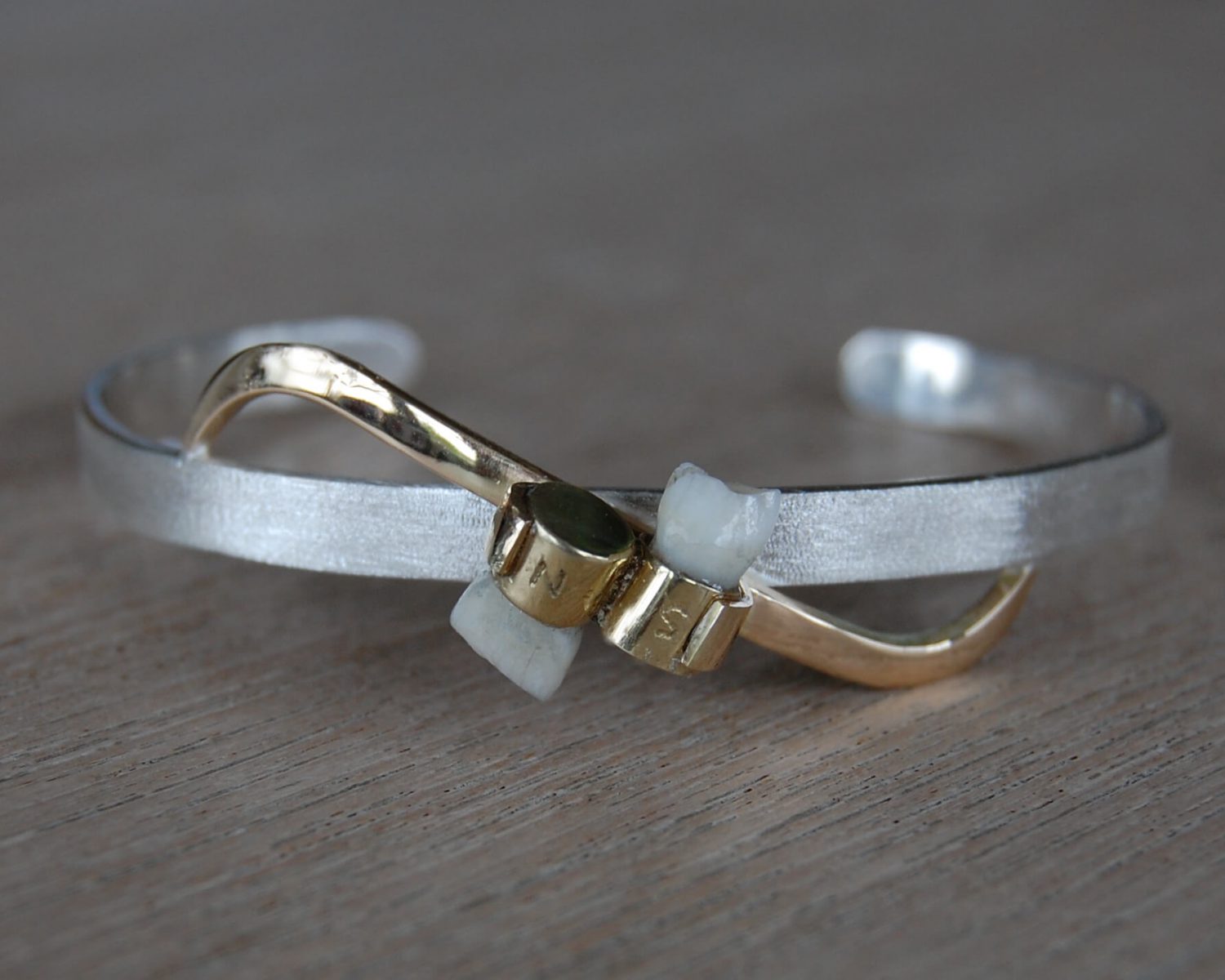 armband zilver goud tanden