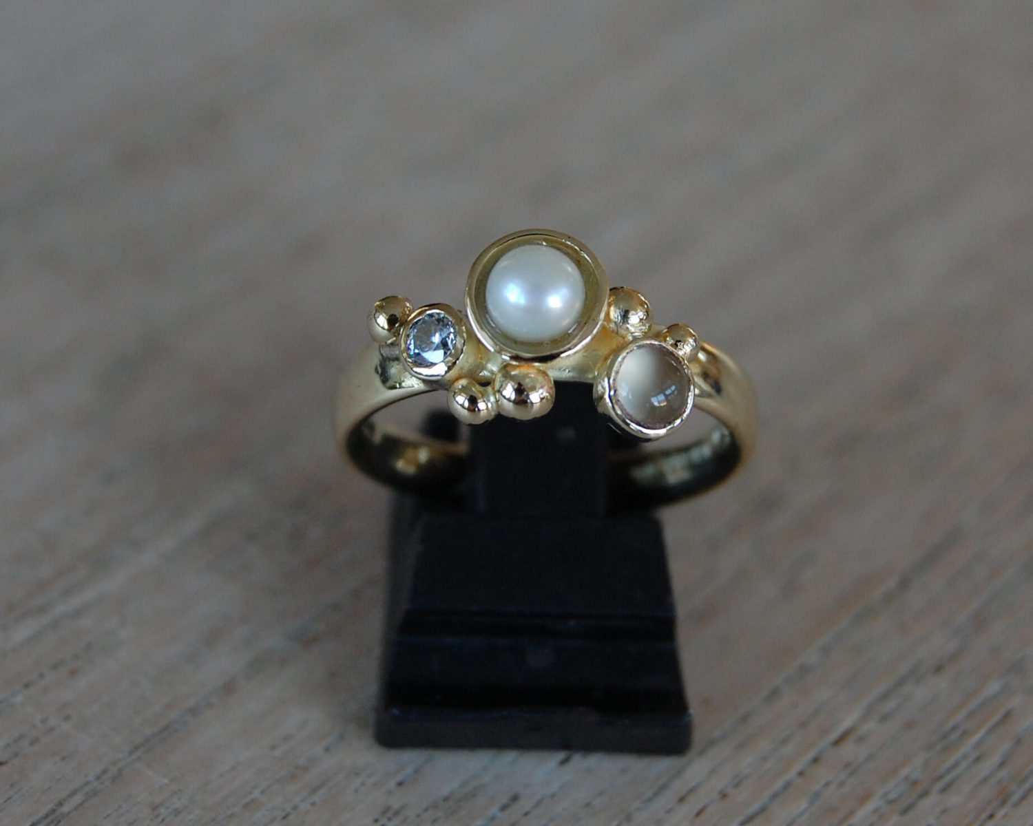 ring goud parel zirkonia maansteen