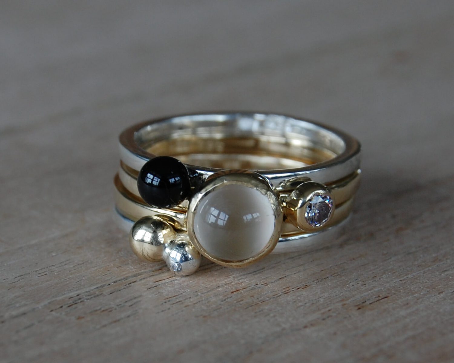 ringen goud zilver maansteen onyx diamant