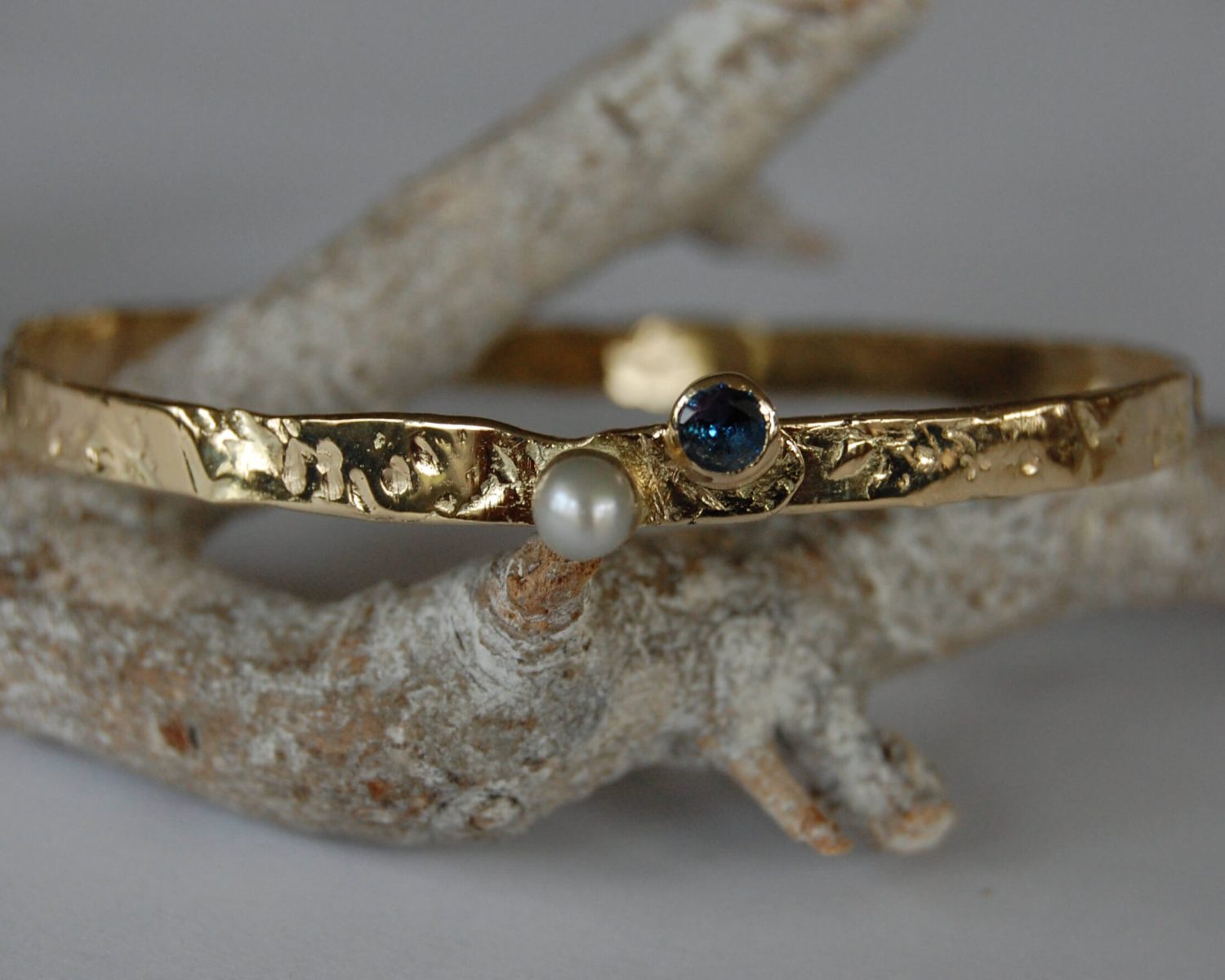armband goud parel spinel