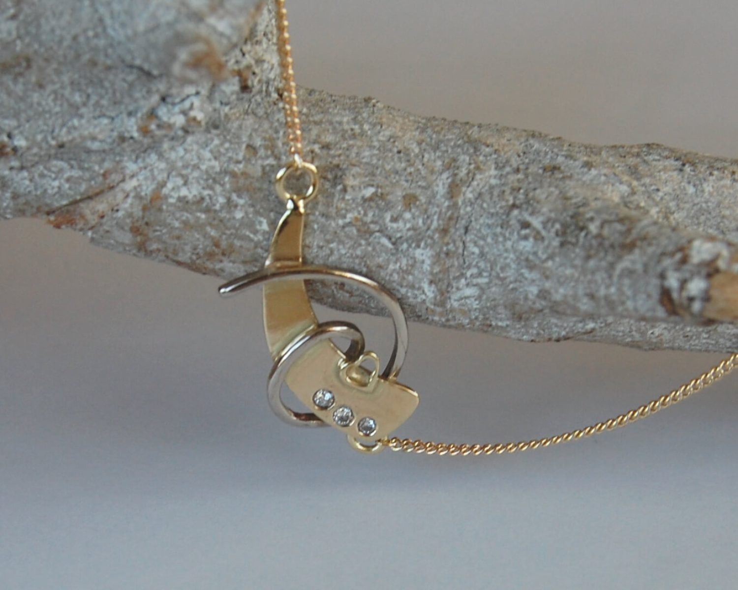 armband geelgoud witgoud diamanten