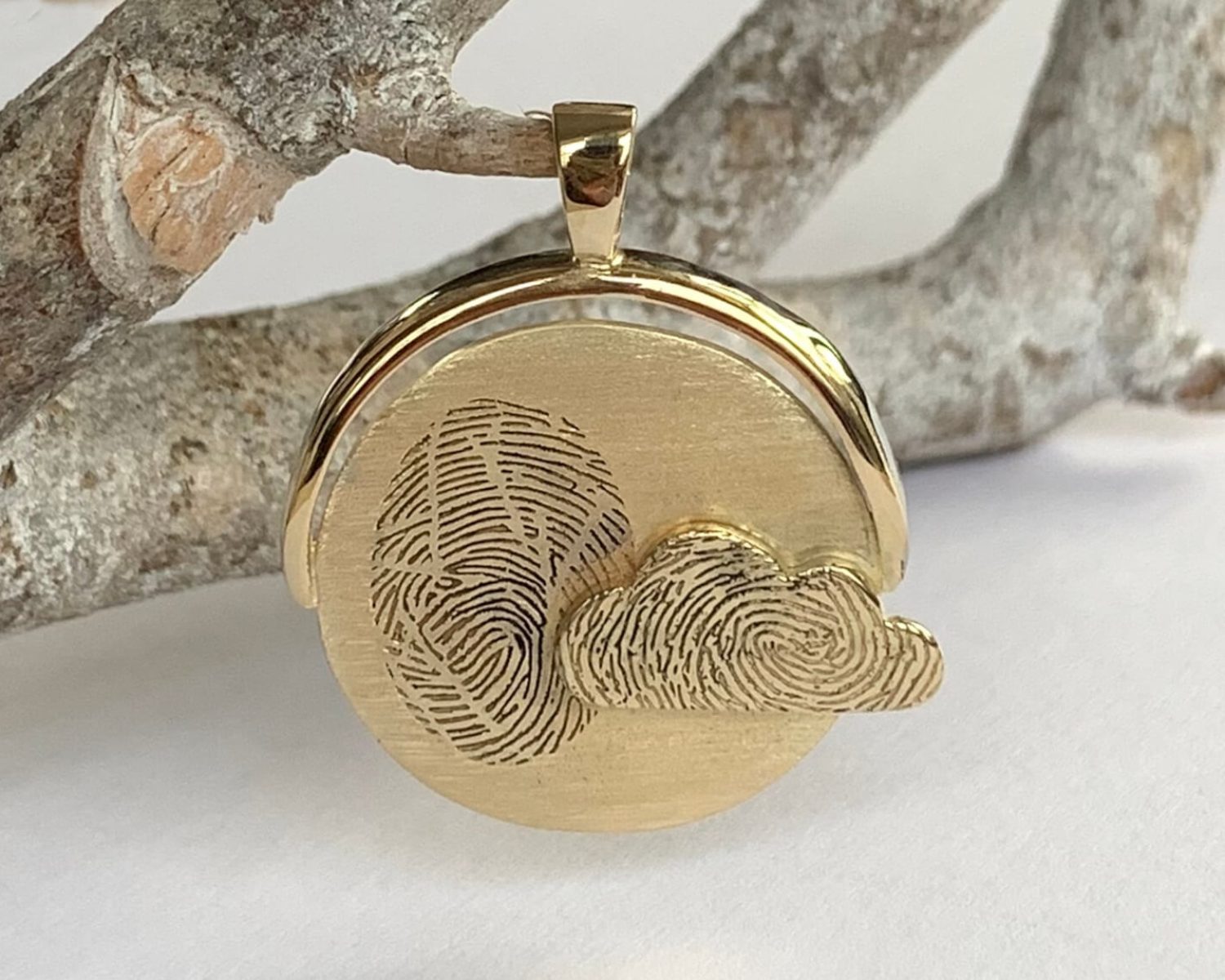 hanger geelgoud witgoud vingerafdrukken