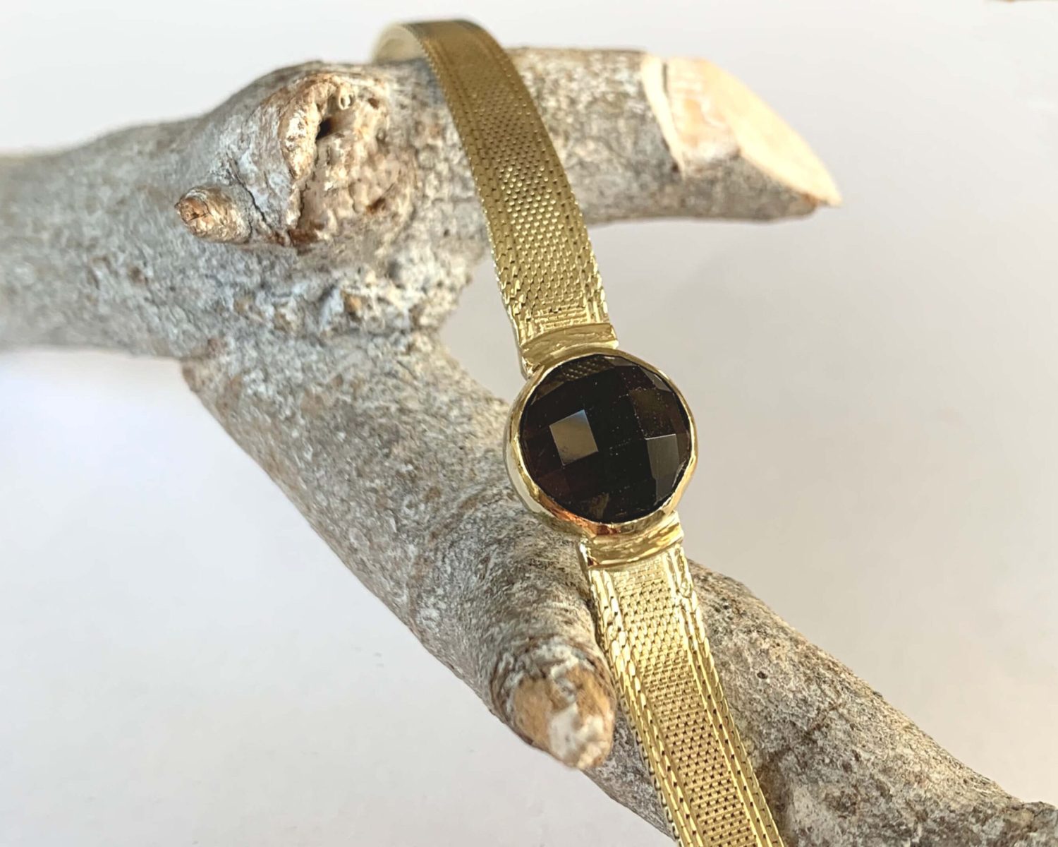 armband goud rookkwarts