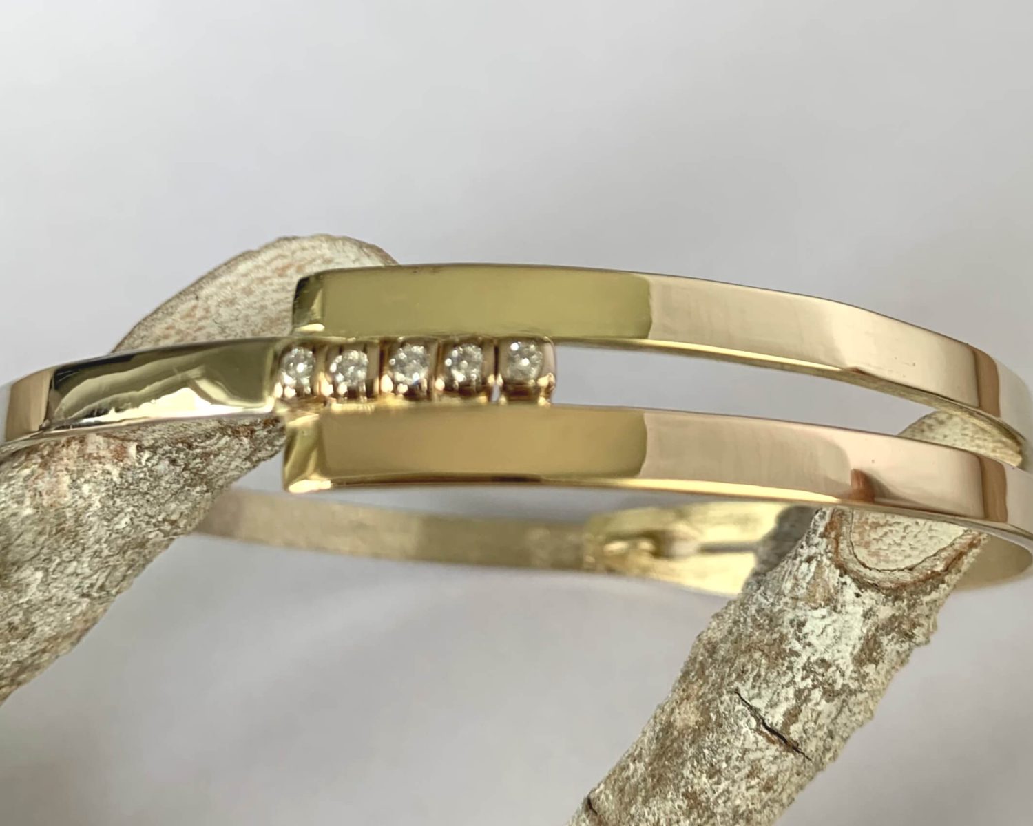 armband geelgoud witgoud diamanten